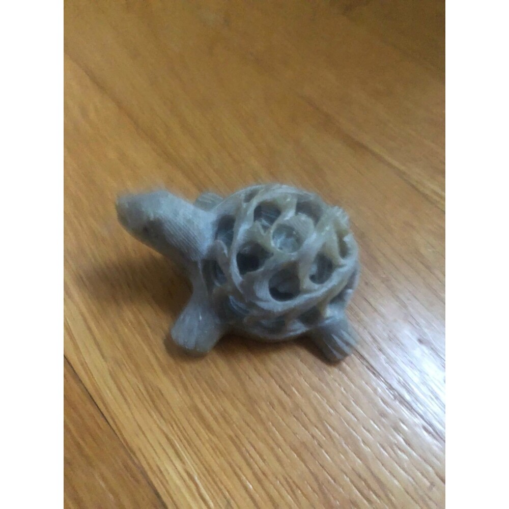 Carved stone turtle with little turtle i
